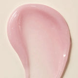 Axis-Y Calamine Pore Control apsule Serum texture reference. The serum is of a light pink gel consistency with tiny capsules in it.
